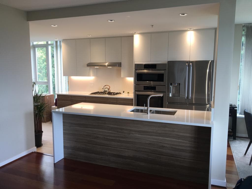 Kitchen cabinets by window